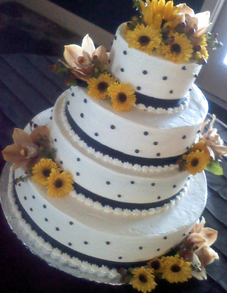 ideas for sunflower wedding cakes with purple ribbon